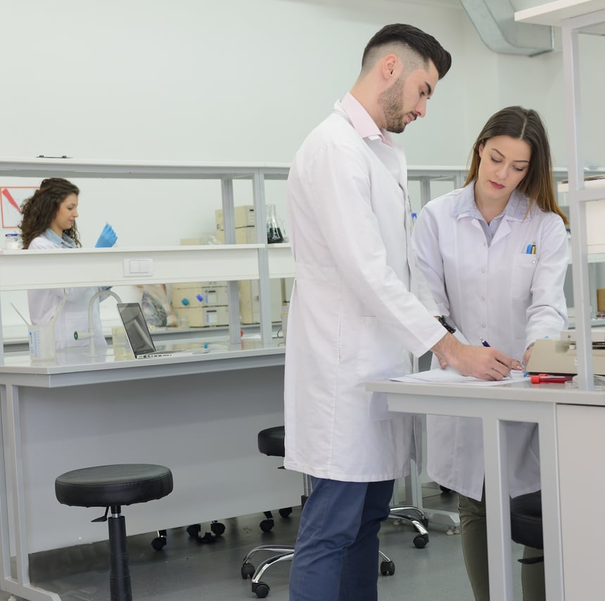 Two people working with a Smart Quality Management Software for Medical Devices | Scilife 