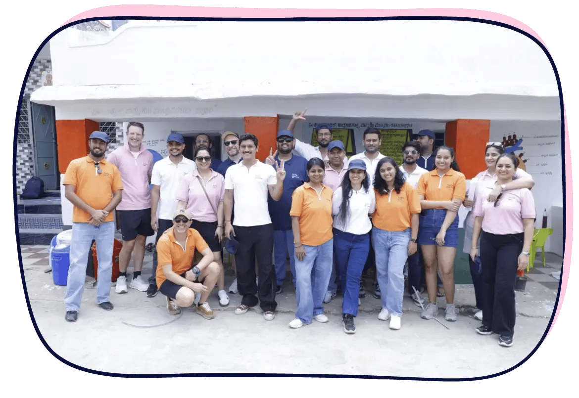 Scilife team members take part in a hands-on volunteering activity, painting a mural to support a local school community | Scilife