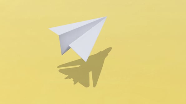 Paper plane casting its shadow in yellow background to represent the hidden potential of DMAIC in Lean Six Sigma | Scilife