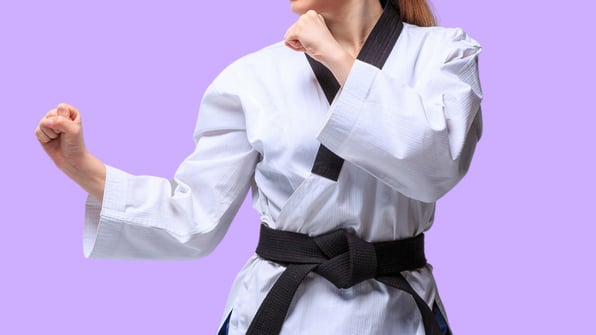 Picture of a karate girl with black belt to represent the Six Sigma black belt in our Scilife article about hot to get Lean Six Sigma Certification 