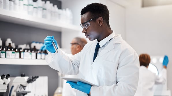 Image that represents someone from a Life Sciences company applying the essentials of a Quality Management System in Life Sciences | Scilife