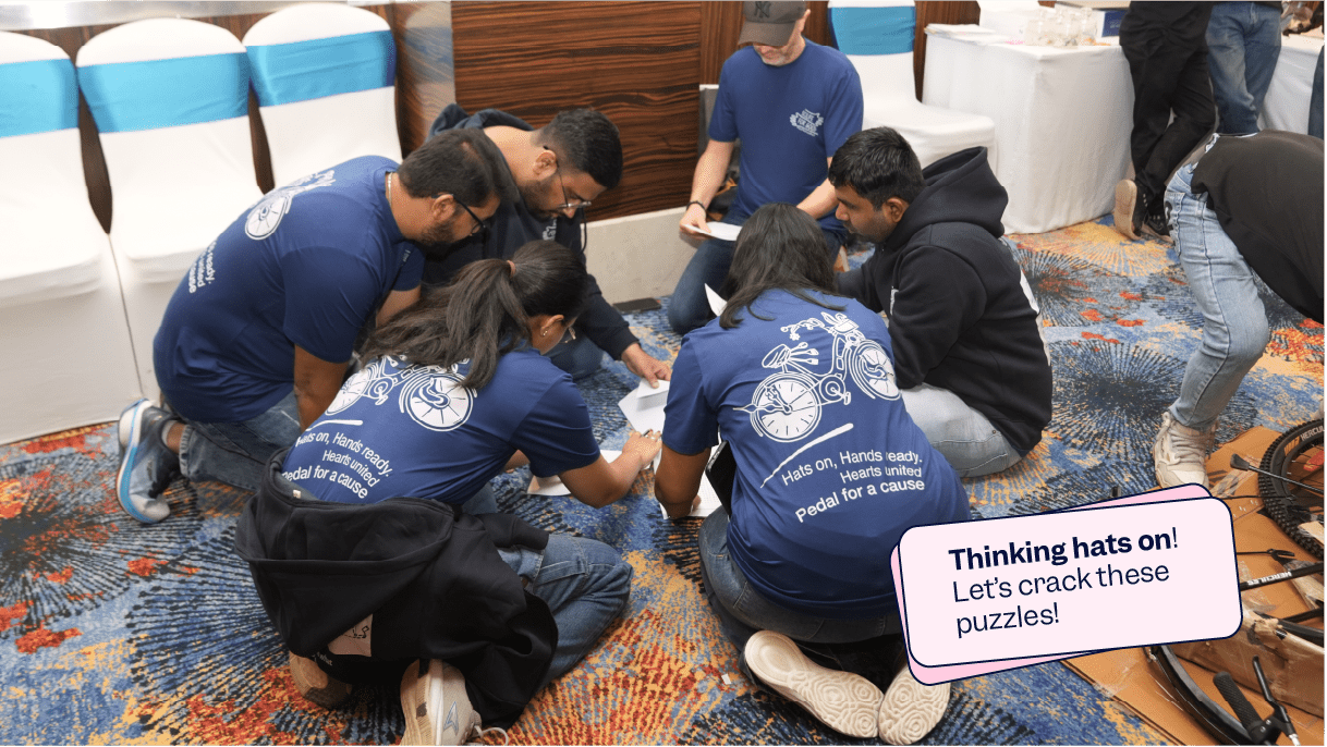 Scilifers doing puzzle to win bike parts and start building | Scilife