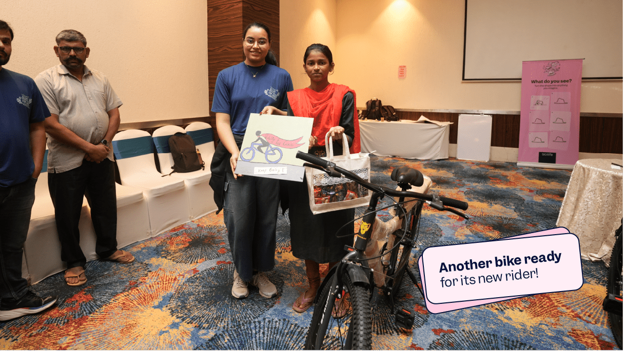 Scilifer with a child who received the charity bike, sweets and canvas | Scilife