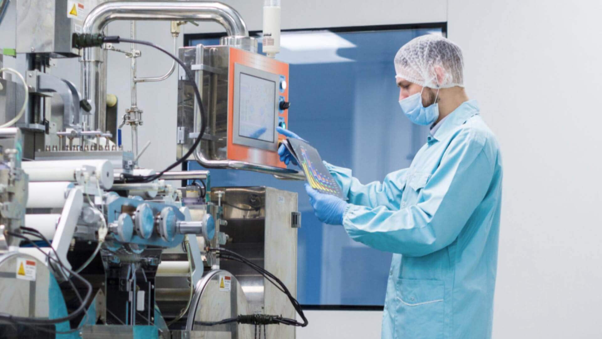 Qualifyze customer story image featuring a technician using equipment in a Pharma setting | Scilife