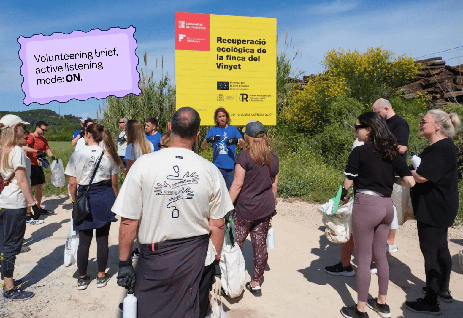 Photo of Scilifers gather for a volunteering briefing in Altafulla, kicking off their nature cleanup day with open ears, active listening, and full hearts | Scilife